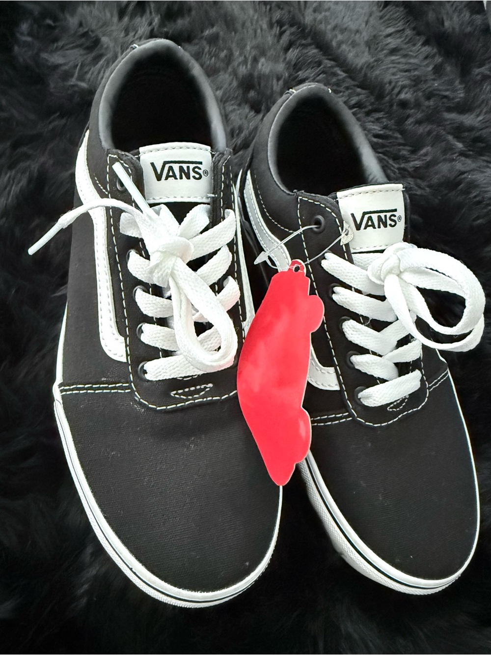Big kids size 4 Vans Classic Black & White Low Top Sneakers. Women is size 6
